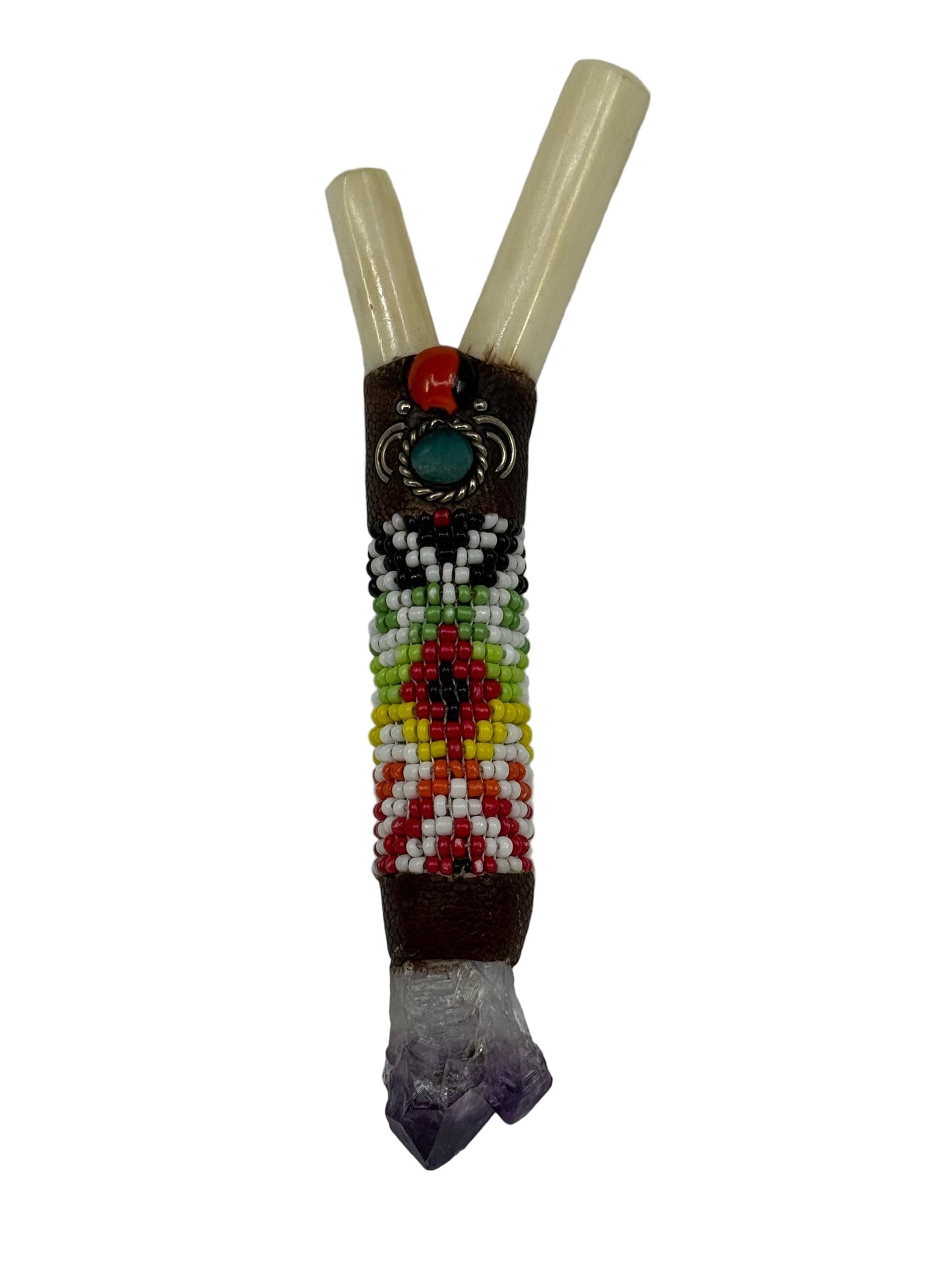kuripe with beads and crystals on a white background
