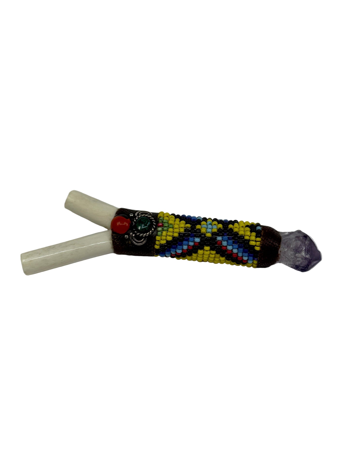 kuripe with beads and crystal on a white background