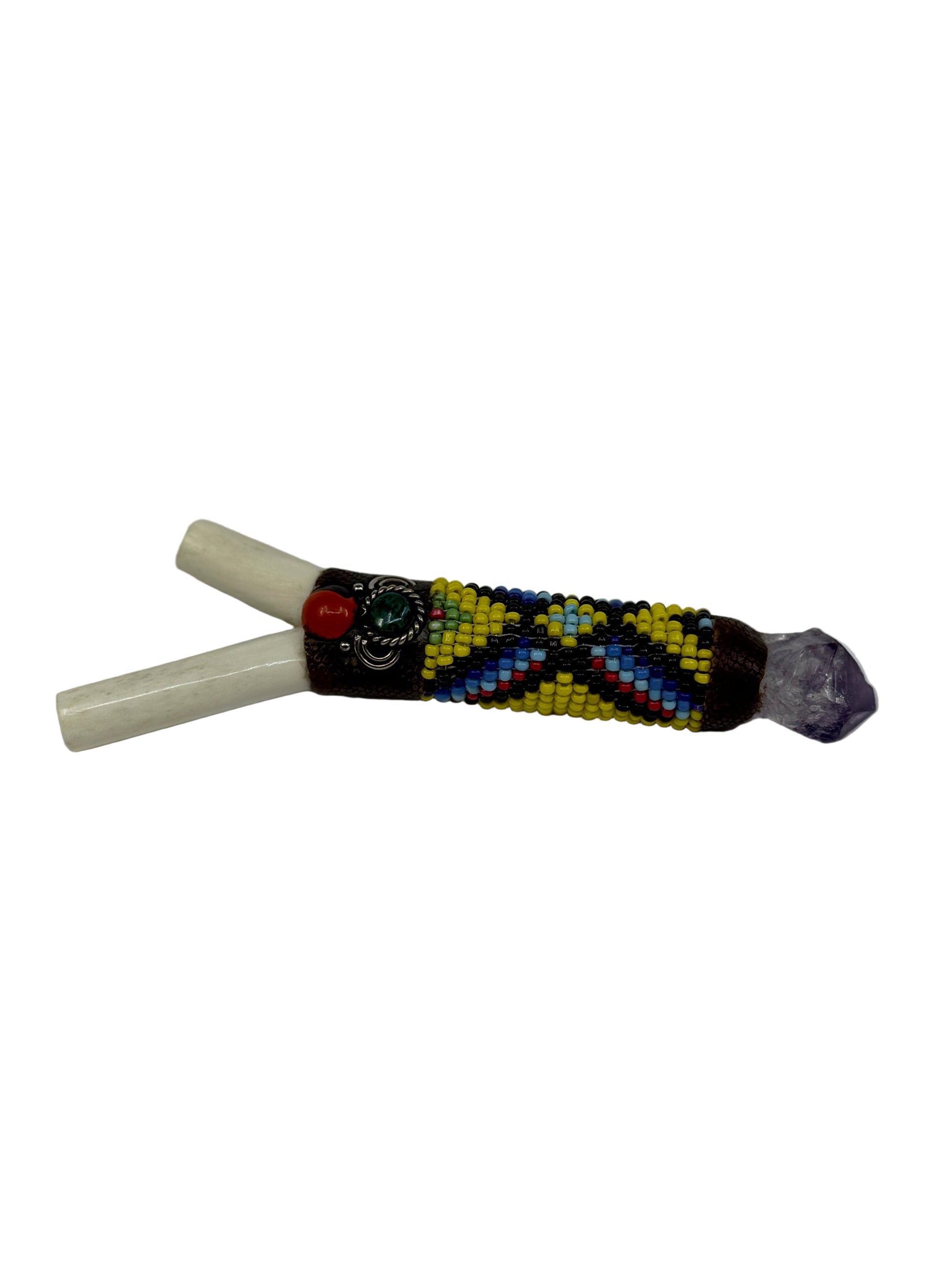 kuripe with beads and crystal on a white background